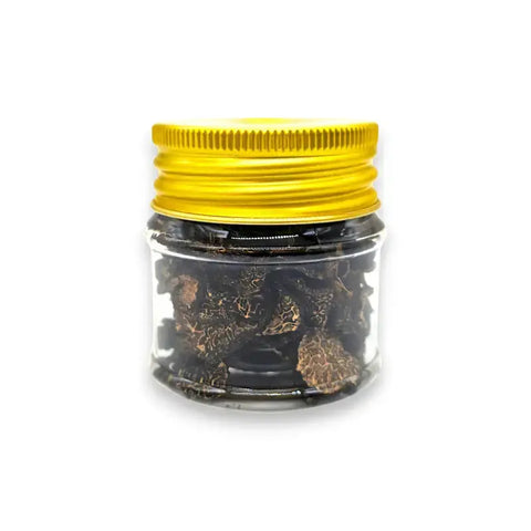 Black winter truffle spice jar with yellow lid, showcasing dried black winter truffle Tuber Brumale