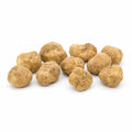 Mittelgroße frische Tuber magnatum weiße Trüffel mit blass ockerfarbenen Oberflächen und natürlicher Formvariation