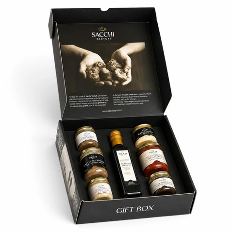 Geöffnete Luxury-Trüffel-Geschenkbox mit sieben italienischen Trüffelprodukten
