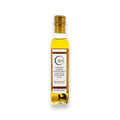 Flasche mit weißem Trüffel-Extra-Natives-Olivenöl mit goldfarbenem Verschluss und Etikett für Gourmet-Kochen
